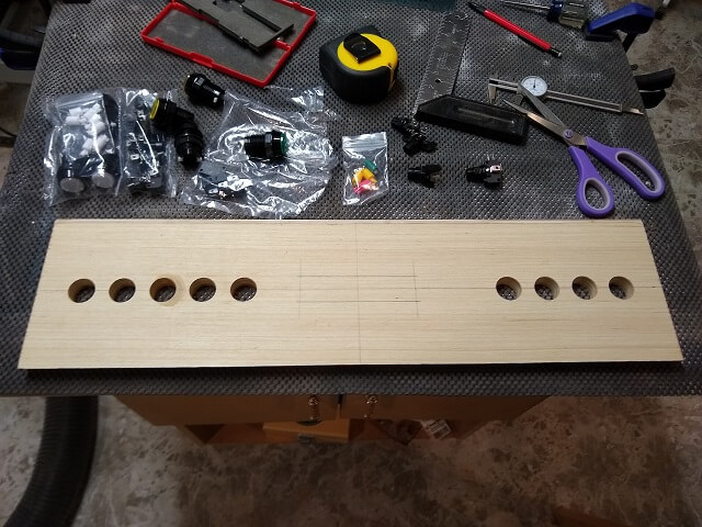 All of the control panel holes drilled.