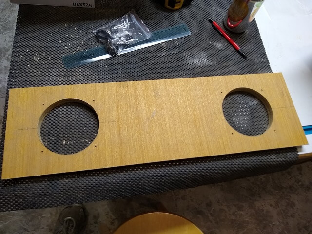The holes for the mounting screws drilled.