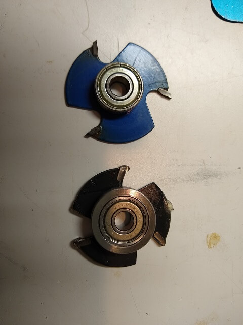 Comparing the bearing sizes between the Harbor Freight and the Katana router bits.