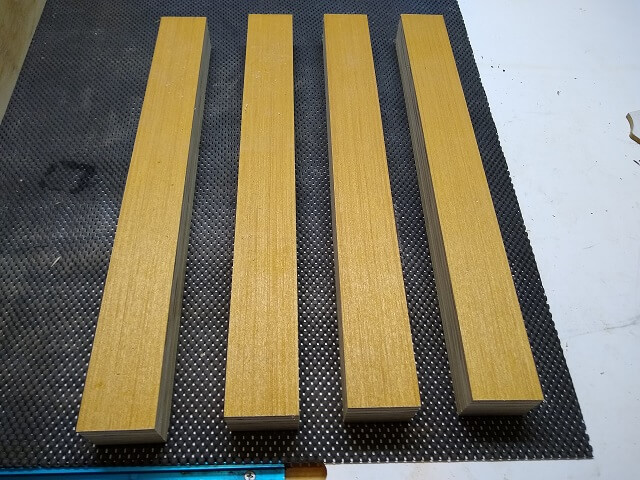 The drawer slider spacers cut to size.