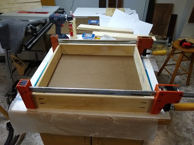 Assembling the first drawer.