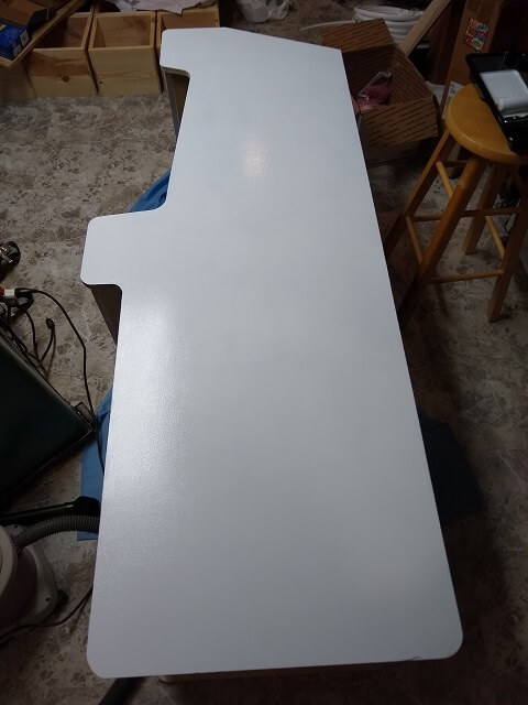 Applying the second coat of primer.
