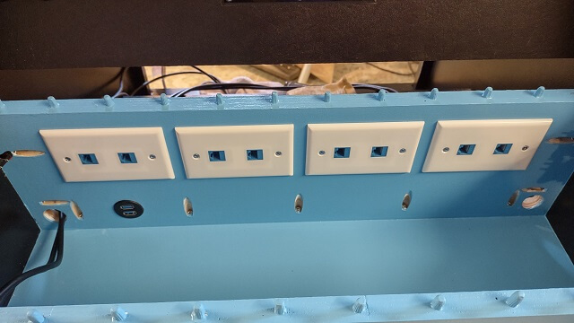 The RJ45 plates installed in the control cavity.