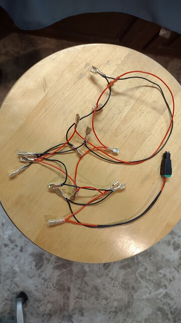 The wiring harness for the illuminated control panel buttons.