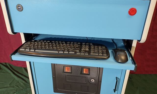 A hidden keyboard drawer that can be used for system maintenance.