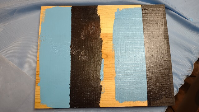 The blue painter's tape removed showing the difference between the two lines..
