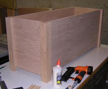 Gluing the legs to the carcass.