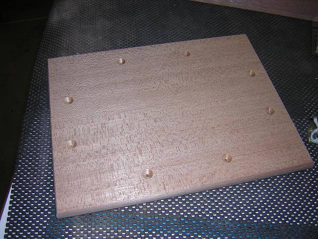 Drilling the screw holes in the top.